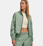 Under Armour - Veste brillante UA Unstoppable Woven pour femme