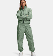 Under Armour - Veste brillante UA Unstoppable Woven pour femme